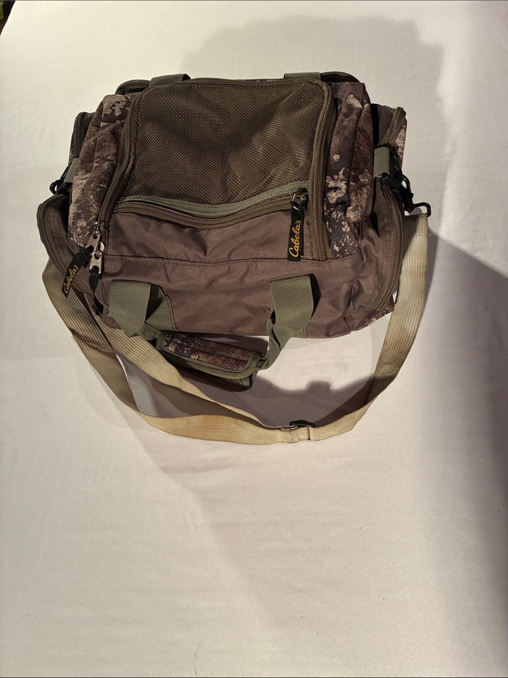 Cabela's Brown and Tan Men's Duffel Bag with Camouflage Accents